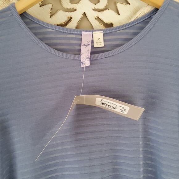 Alya from Francesca's Women's Short Sleeve Ruffle Asymmetric Hem Tunic Top Blue - Picture 9 of 9